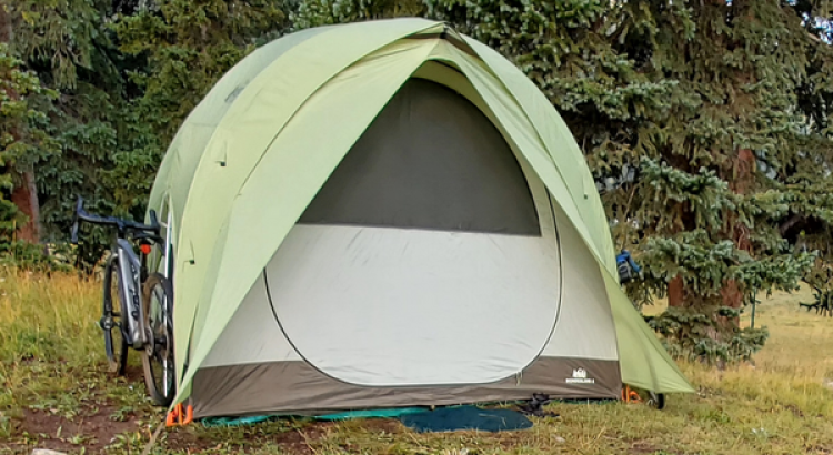 tent with forest in background